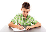 Schoolboy at exam Royalty Free Stock Images