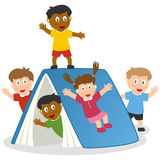 Kids Playing with Giant Book Royalty Free Stock Image