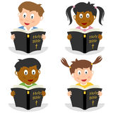 Kids Reading the Holy Bible Royalty Free Stock Image