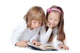 Two girls read the book Stock Image