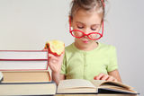 Little girl in glasses read book Royalty Free Stock Photo