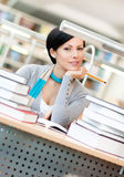 Female student studies at the reading hall Stock Image