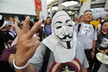 Anti government white mask protest in bangkok an protester wearing a guy fawkes joins a rally s shopping district on june thailand Royalty Free Stock Photography