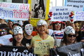 Anti government white mask protest in bangkok protesters wearing guy fawkes masks rally s shopping district on june thailand the Royalty Free Stock Images