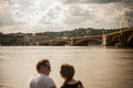 Budapest floods people watching the show of the swollen danube on its banks in Royalty Free Stock Image