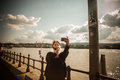 Budapest floods people watching the show of the swollen danube on its banks in Royalty Free Stock Images