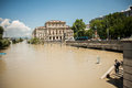 Budapest floods people watching the show of the swollen danube on its banks in Stock Photo
