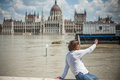 Budapest floods people watching the show of the swollen danube on its banks in Royalty Free Stock Photo