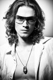 BW portrait of long-haired handsome man Stock Photo