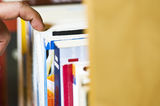 Choosing book Royalty Free Stock Image