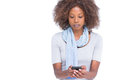Concentrated woman typing a text message on white background Stock Photo