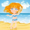 Cute little girl listen big shell on a sunny beach to the sound of the sea in Stock Photography