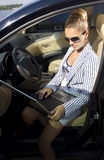 Fan with laptop Royalty Free Stock Images