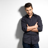 Fashion portrait of young man in black shirt Stock Images