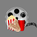Film with popcorn and a drink on gray background Stock Photo