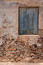 Blue window at deserted house Free Stock Images