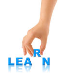 Hand and word Learn Stock Photo