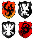 Heraldry shields phoenix lion eagle and dragon Royalty Free Stock Photography