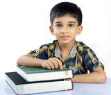 Indian School Boy With TextBook Royalty Free Stock Photos