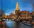 The lights of amsterdam an oil painting on canvas a peaceful panoramic evening view montelbaans tower and city reflecting in Royalty Free Stock Image