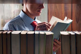 Men reading a book Royalty Free Stock Image