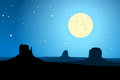 Monument valley arizona agaist a starry night sky eps vector silhouette of the rock formations of usa against blue moon lit Stock Photography