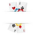 Playing cards and poker chips on a white background Royalty Free Stock Photo