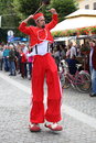 Red entertainer on stilts and big boots sibiu romania june sibiu international theatre festival itinerary performance by fadunito Royalty Free Stock Photography