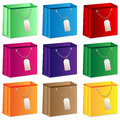 Set of colored shopping bags on white background Stock Images