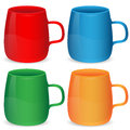 Set of cups of different color on a white background Royalty Free Stock Photo