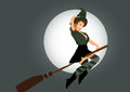 Sexy witch flying on broom Stock Photo