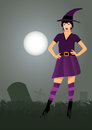 Sexy witch halloween in cemetery Stock Photography