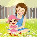 Single mother family beautiful enjoying nature with her adorable little daughter on the park Stock Image