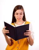 Student reading a book Royalty Free Stock Image