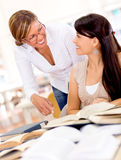 Teacher helping a student Stock Photos