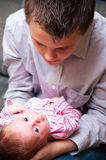 Teenager with baby Stock Image