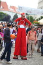 Undecided red clown on stilts sibiu romania june sibiu international theatre festival itinerary performance by fadunito band from Stock Images