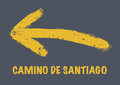 Way of saint james arrow yellow painted yellow sign the camino de santiago Royalty Free Stock Photo