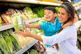 Woman at the supermarket with her son Stock Photos