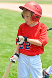 Youth batter on deck Royalty Free Stock Image