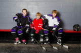 Youth Hockey Players in Dressing Room Stock Photo